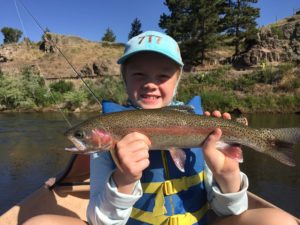 Young Girl and Rainbow Trout